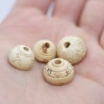 Group of 4 Ancient Ivory spindle whorl