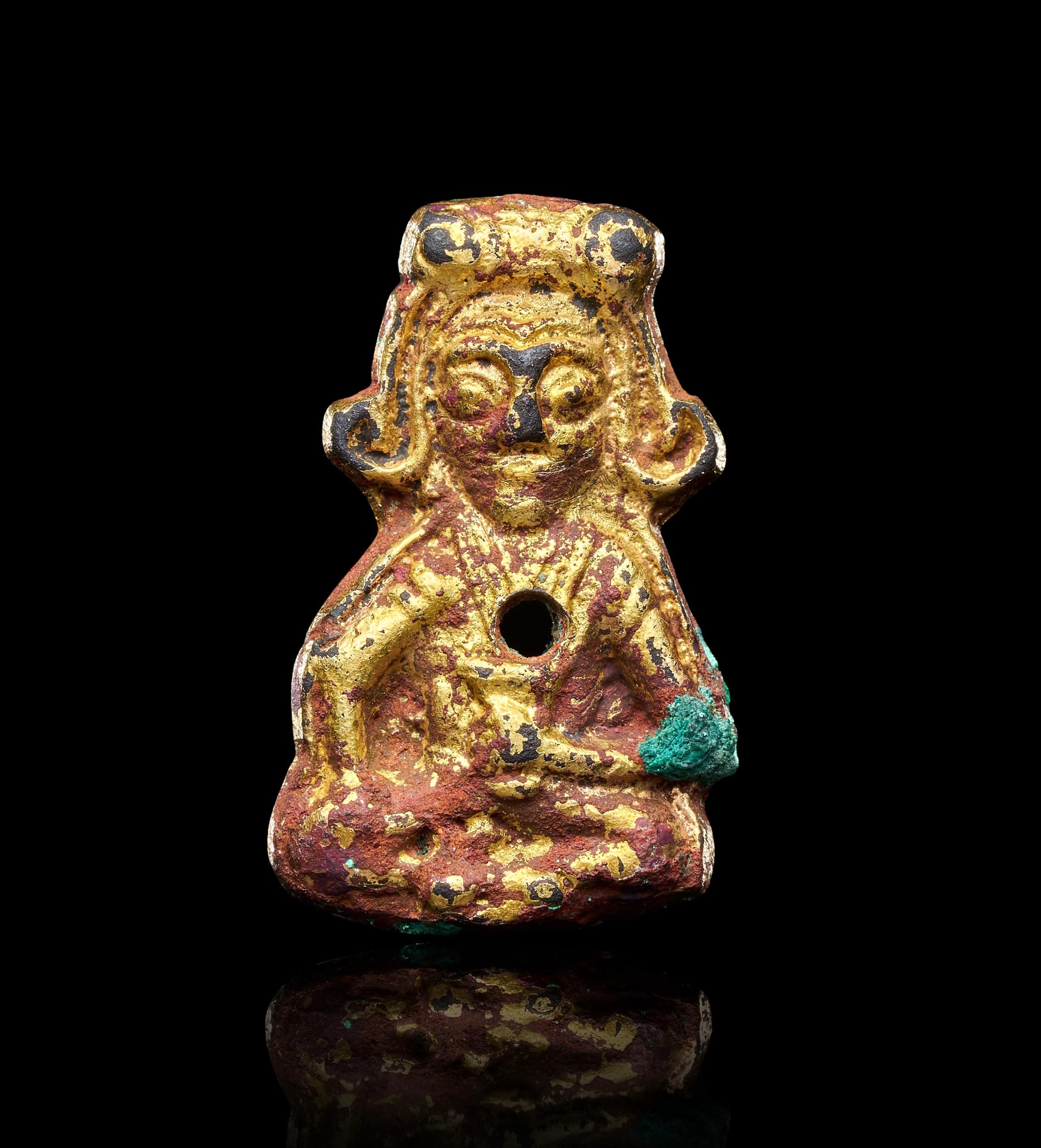 2597 A Sogdian gilt copper-alloy repoussé amulet, central asia, circa 6th–8th century